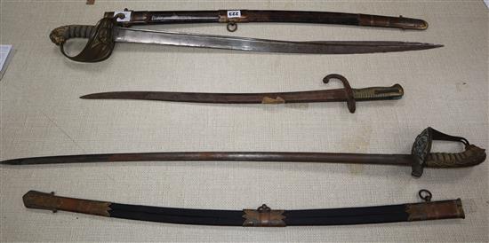 Two officers swords and a bayonet